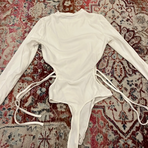 Tops White Long Sleeve Bodysuit With Hips Exposed Poshmark — free download